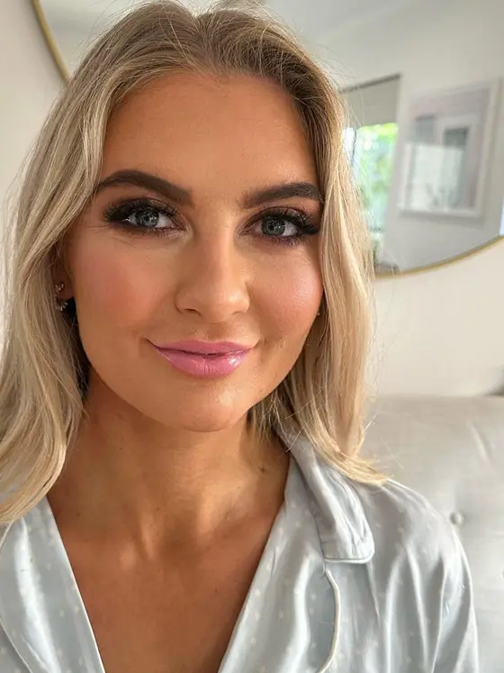 Defined-eye soft glam getting ready before the day