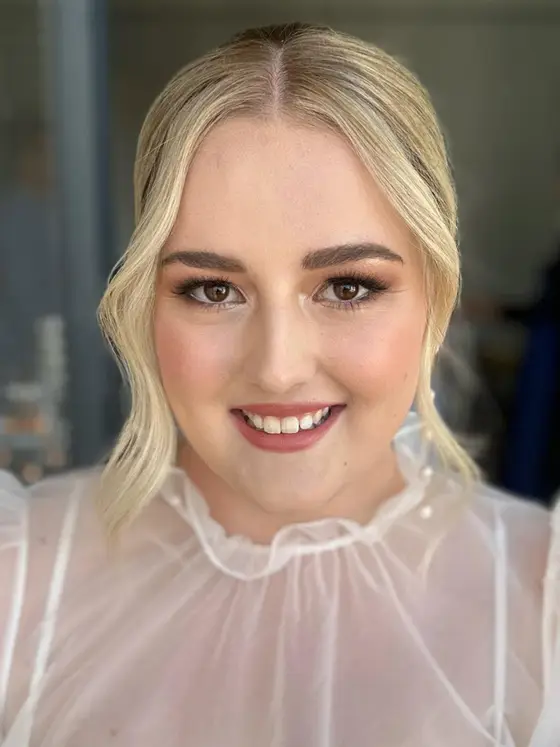 Fresh, glowing bridal-party makeup with a soft lip