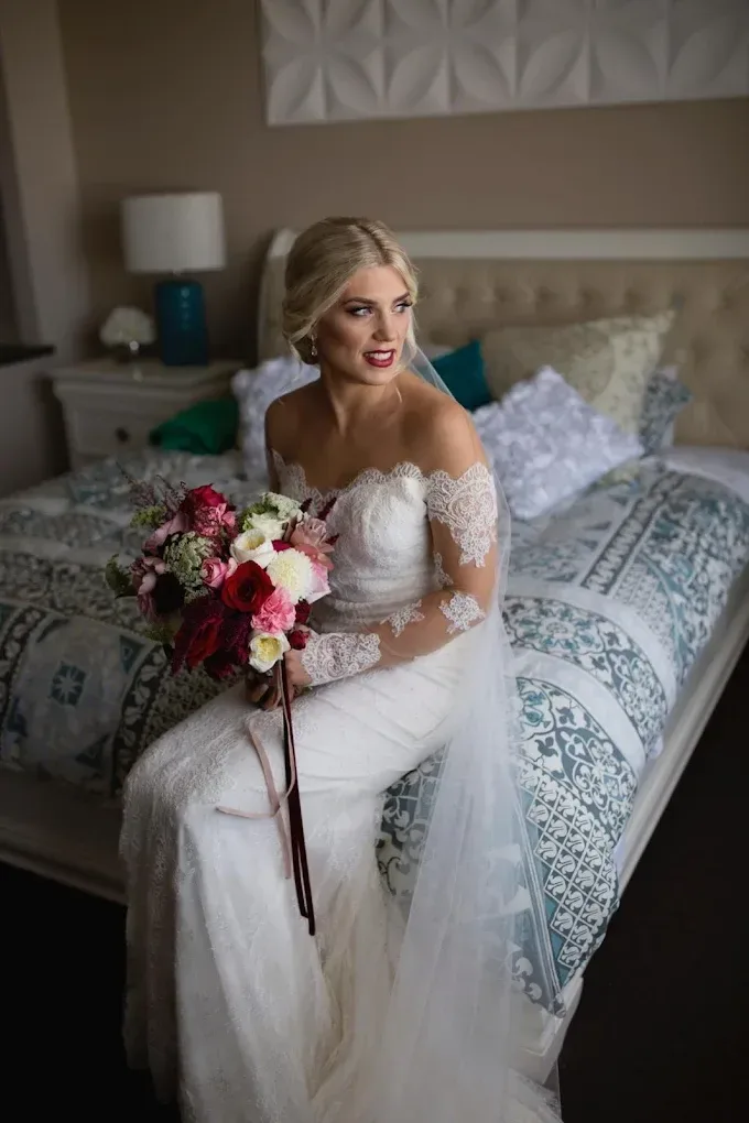 Perth bride in a lace gown with soft, luminous bridal makeup by Chelsea Crocos