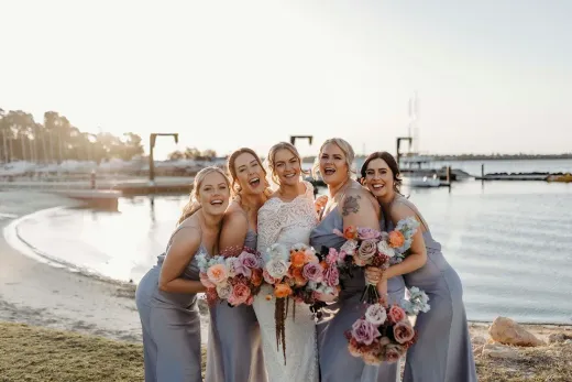 Bridal party by the water
