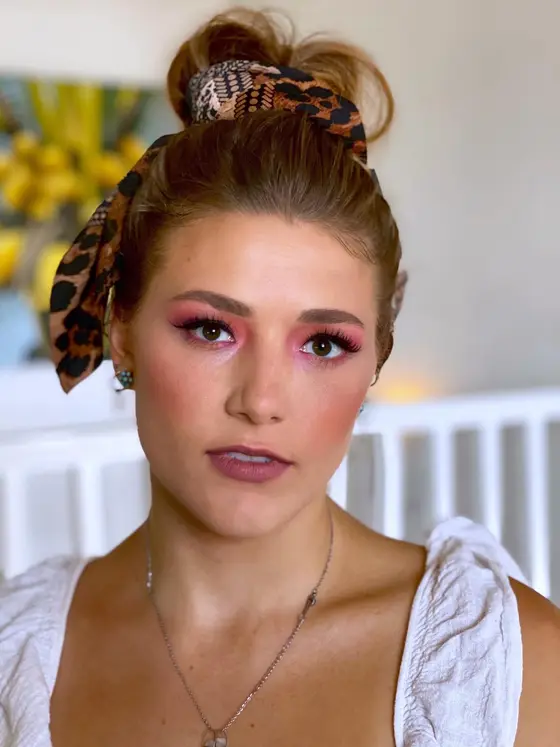 Rose-toned glam eye with luminous skin and a soft lip
